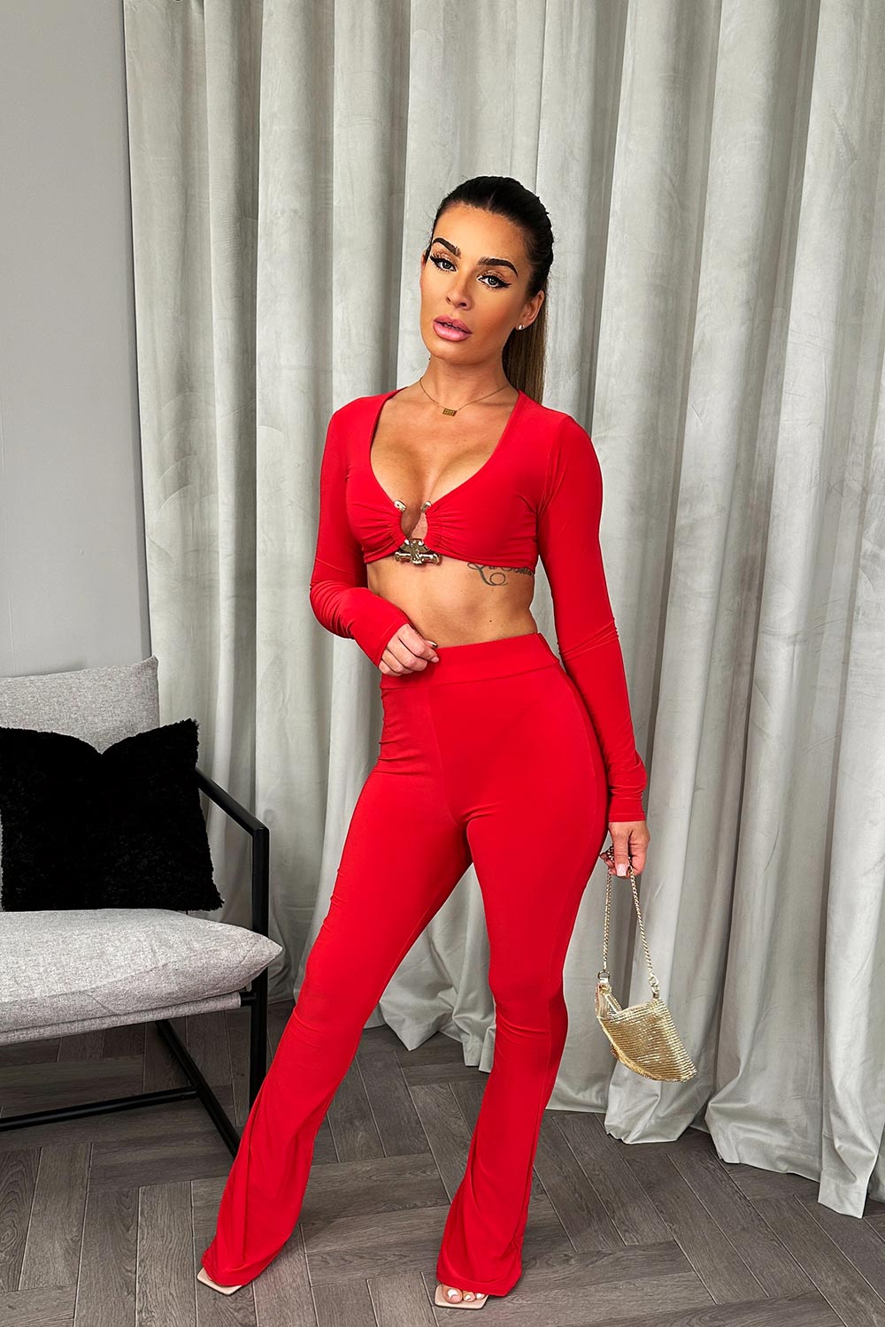 crop top and trousers co ord set with gold buckle detail