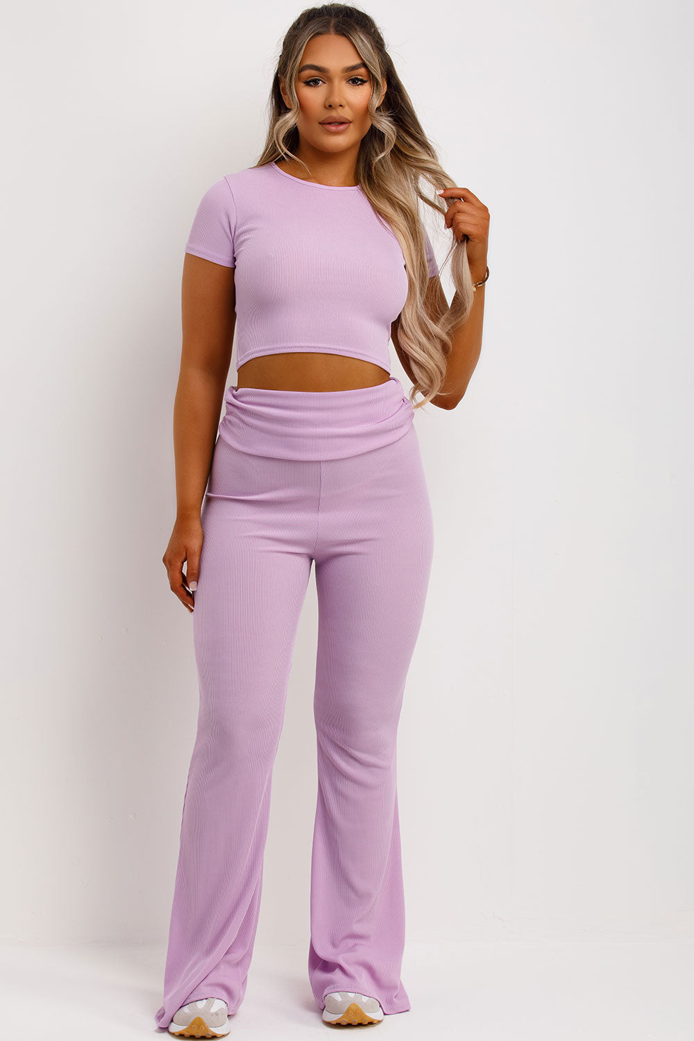 ribbed crop top and skinny flare trousers with fold detail