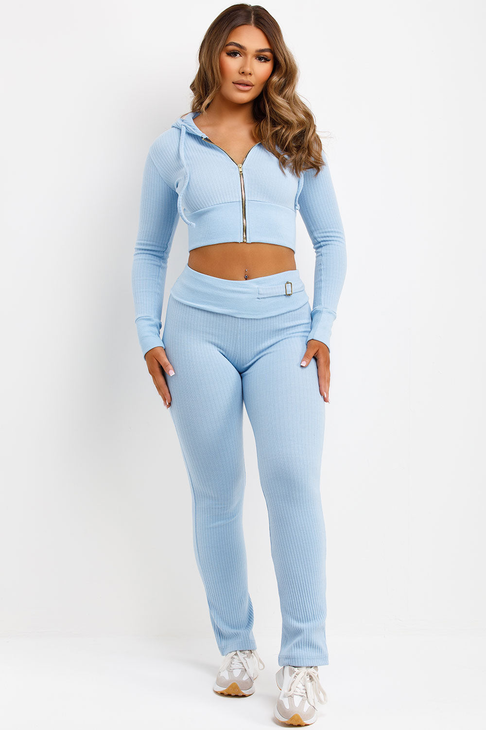 womens zip up crop hoodie and fold over waist buckle detail skinny flare trousers co ord set airport outfit