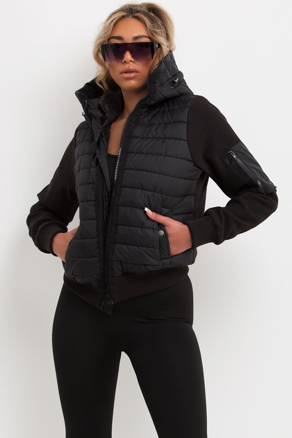 womens black puffer jacket with ribbed sleeves prada inspired