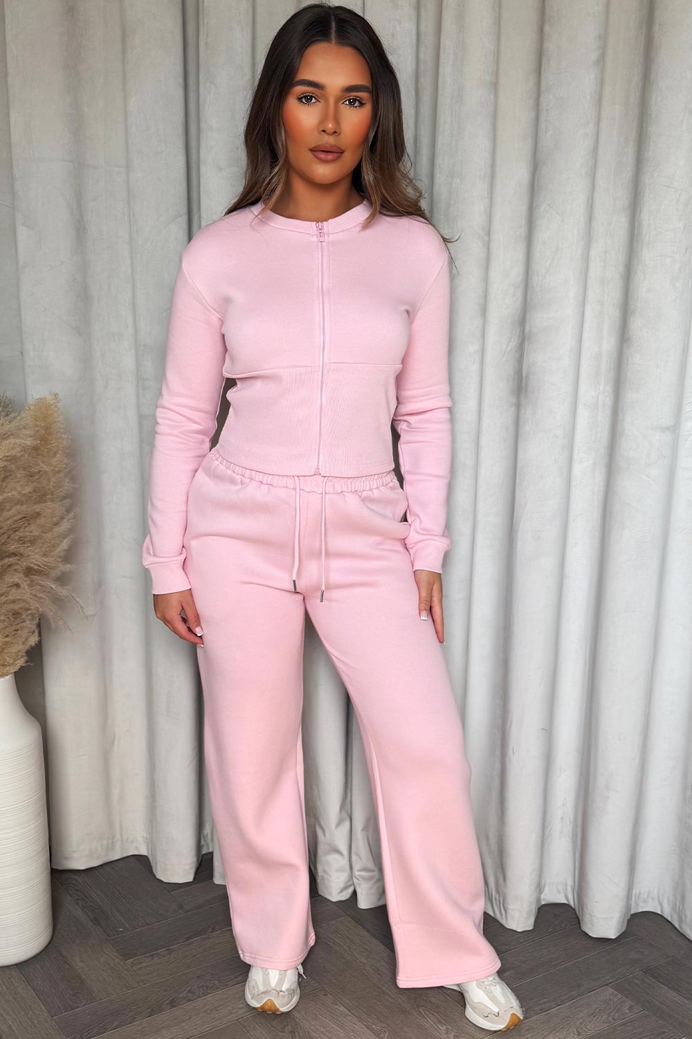 zip up crop sweatshirt corset detail and joggers tracksuit co ord set styledup airport travelling outfit