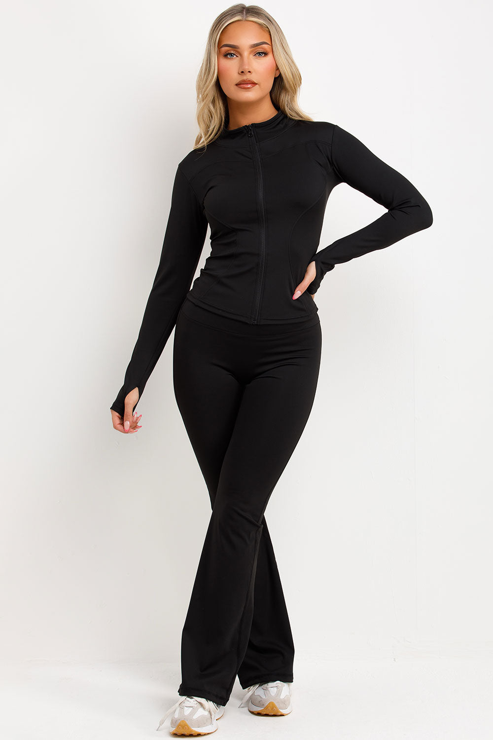 zip up sports jacket and scrunch bum skinny flare trousers two piece set black