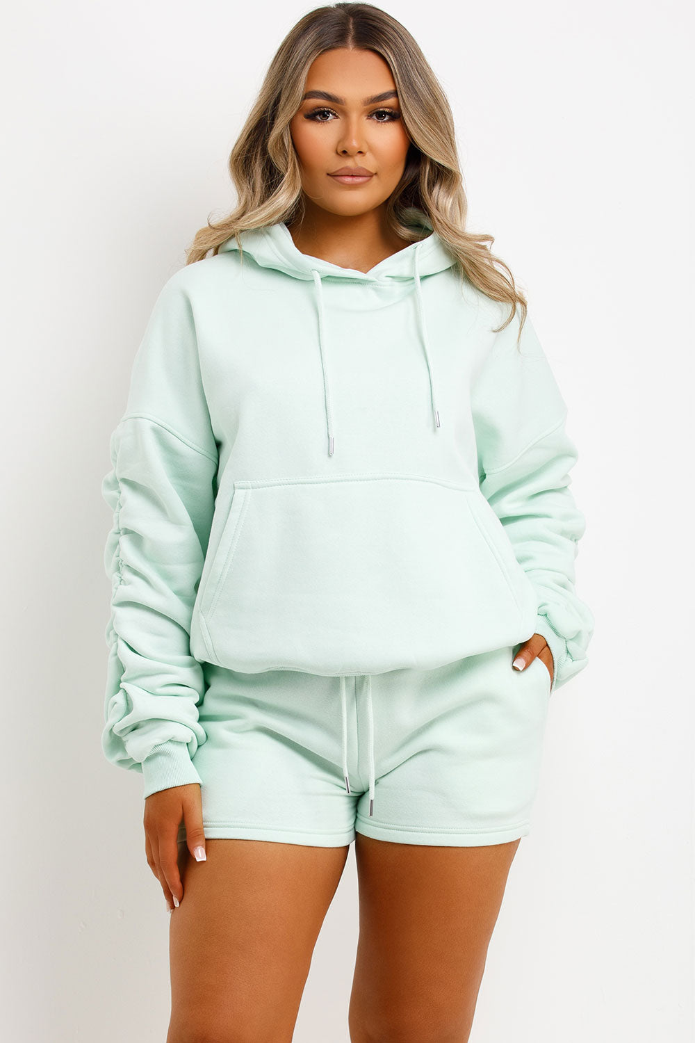 womens short tracksuit oversized ruched sleeve hoodie and shorts lounge set airport outfit