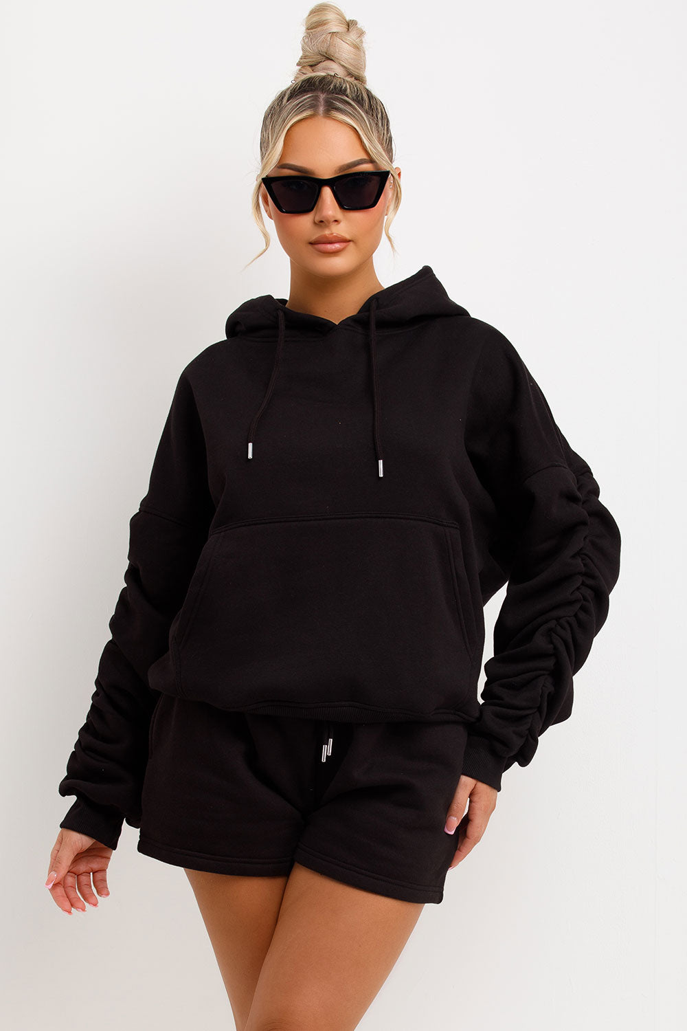 womens runner shorts and hoodie tracksuit set airport outfit