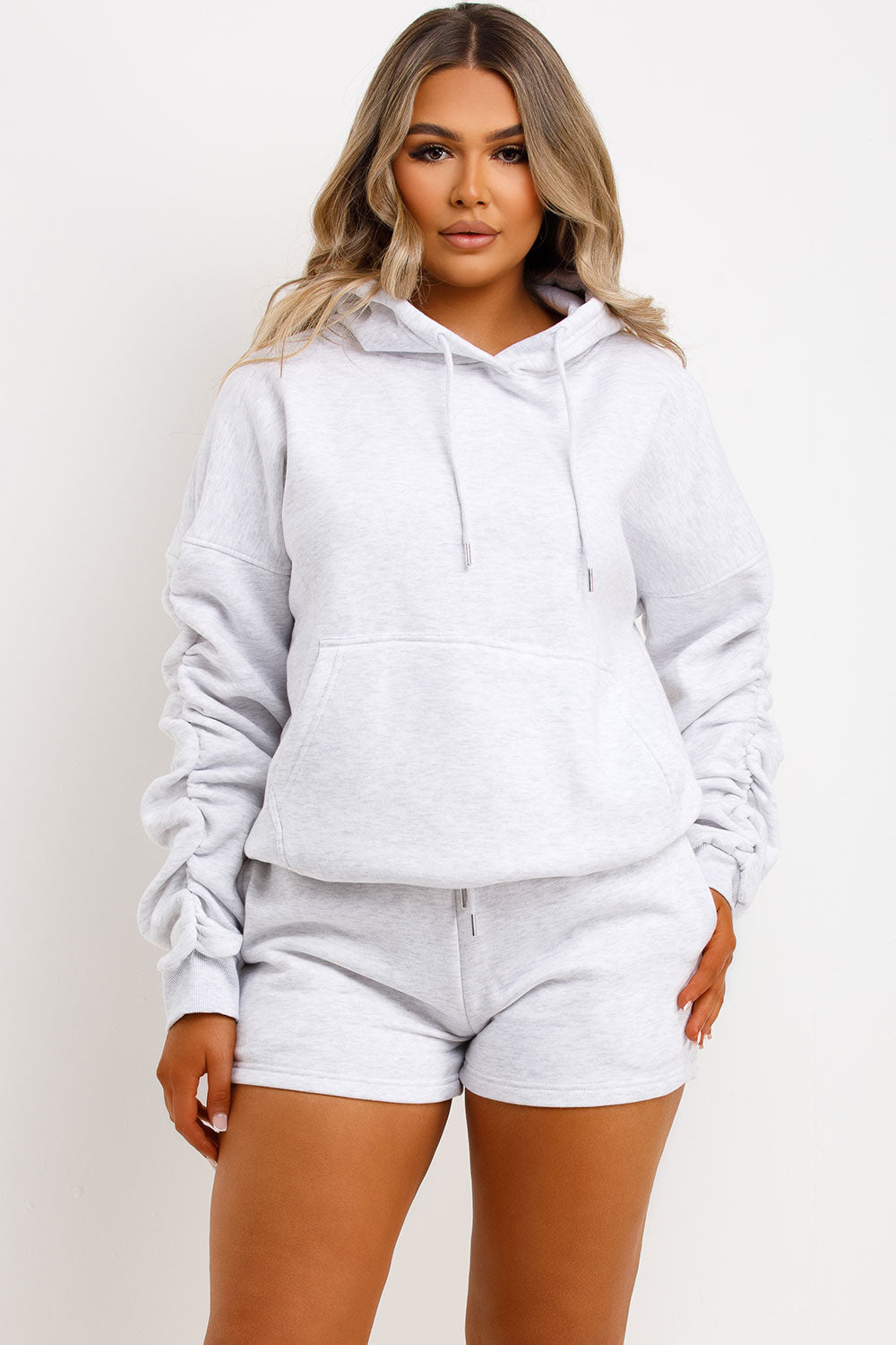 womens oversized ruched sleeve hoodie and shorts lounge set airport outfit