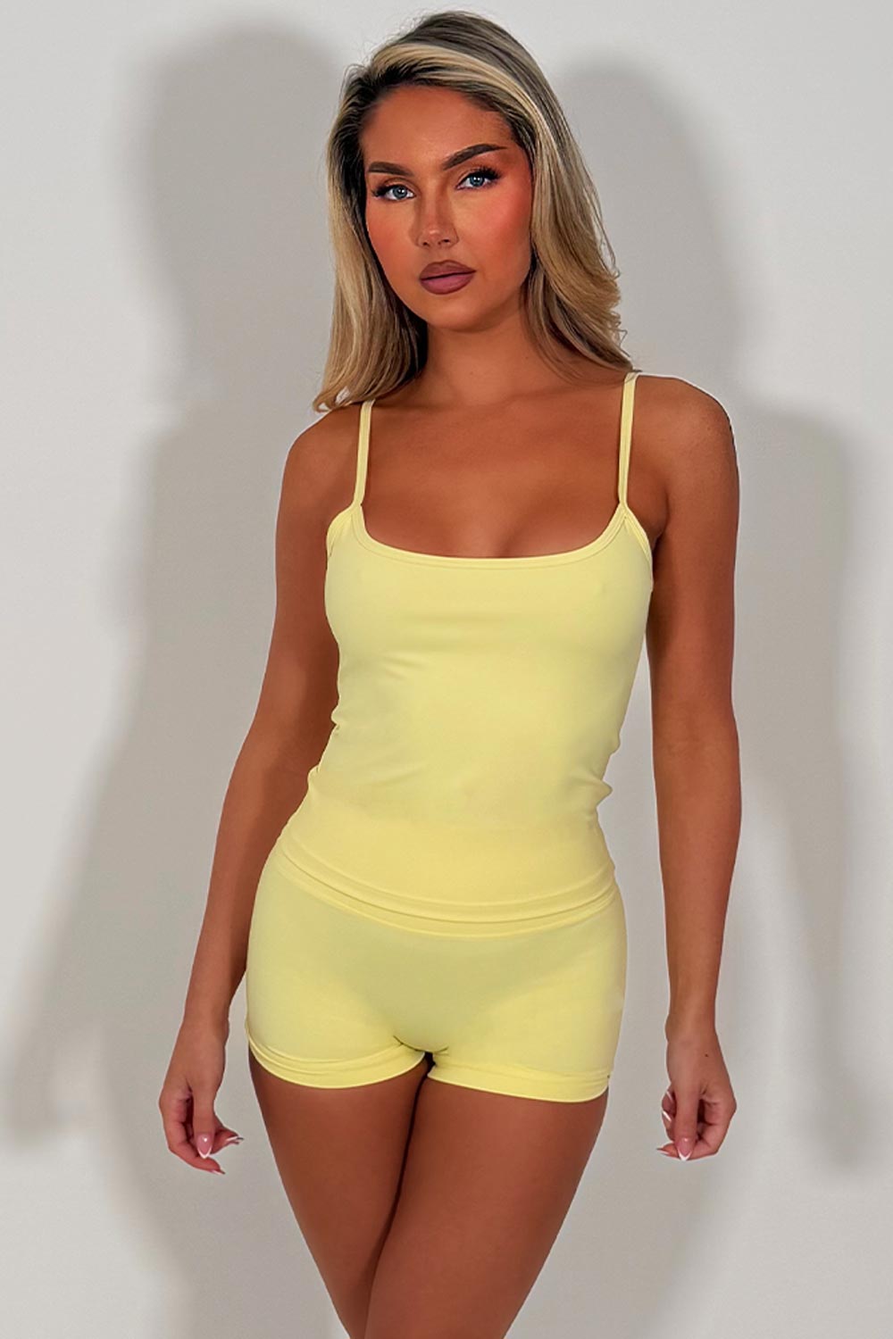 alo yoga scrunch bum shorts and tank top two piece matching co ord set activewear for yoga pilates styledup uk sale