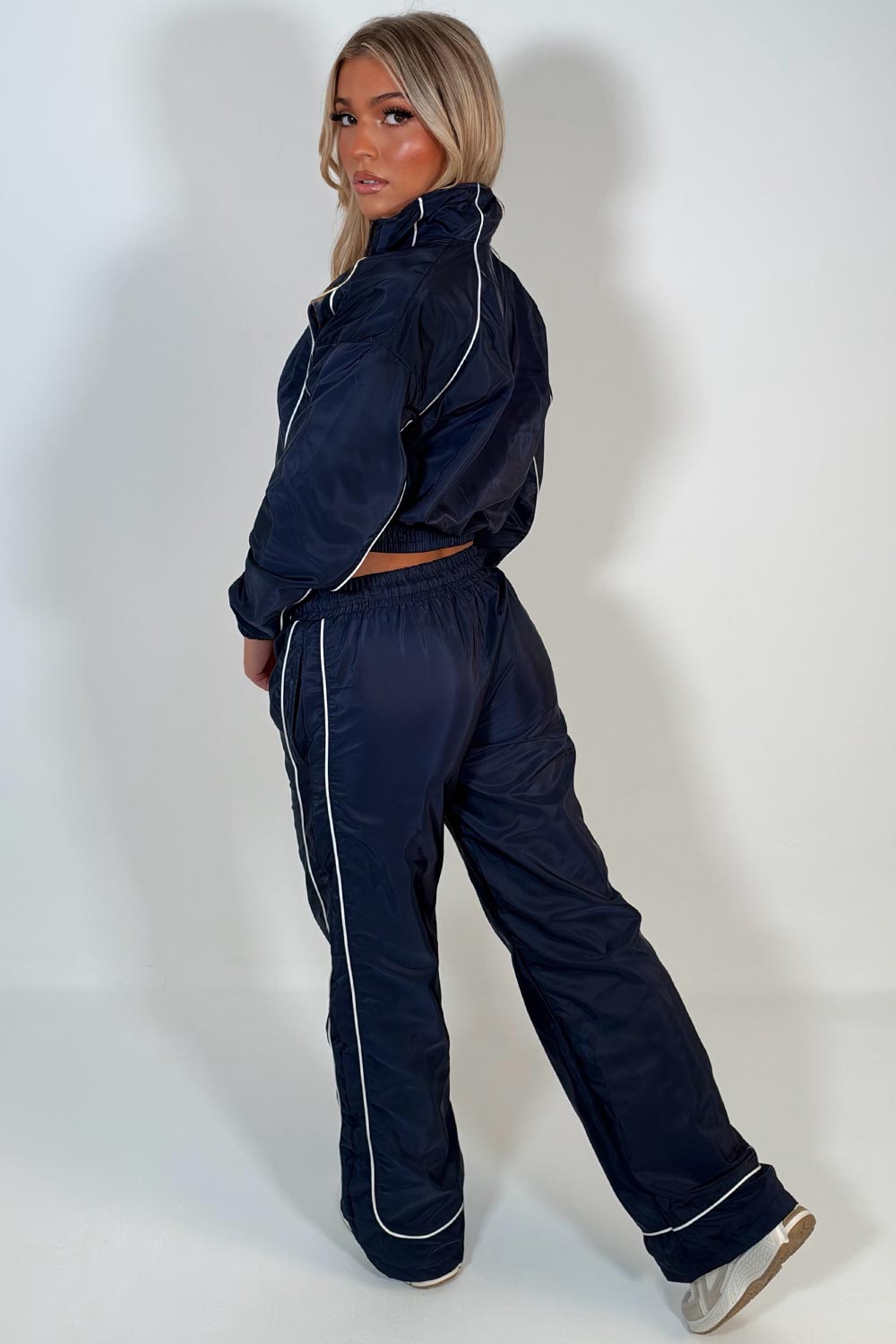 navy crop funnel neck jacket and wide leg trousers tracksuit holiday festival rave outfit styledup uk