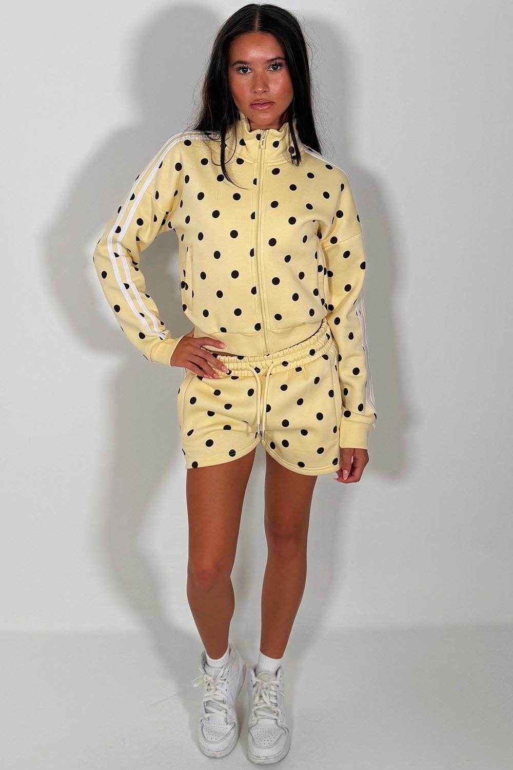 womens yellow airport outfit short tracksuit in trendy polka dot print styledup uk