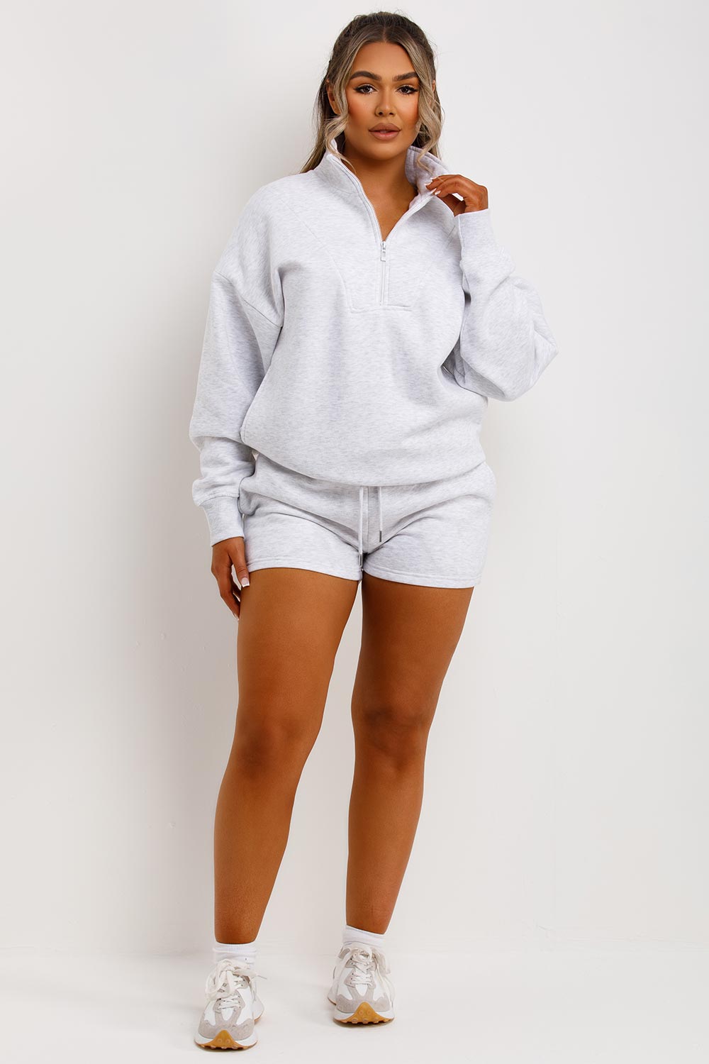 womens runner shorts and half zip jumper tracksuit lounge set airport outfit uk