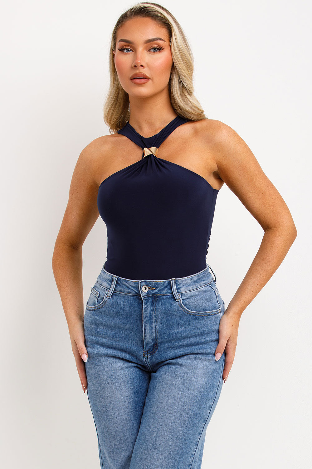 halter neck gold buckle going out top navy bodysuit styled up