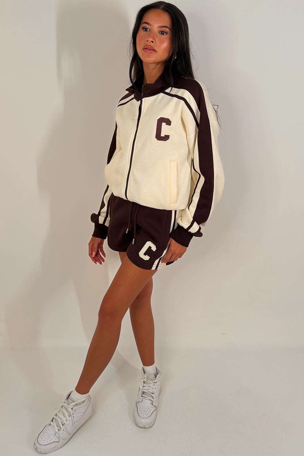 womens short tracksuit with c emblem styledup airport outfit zara uk