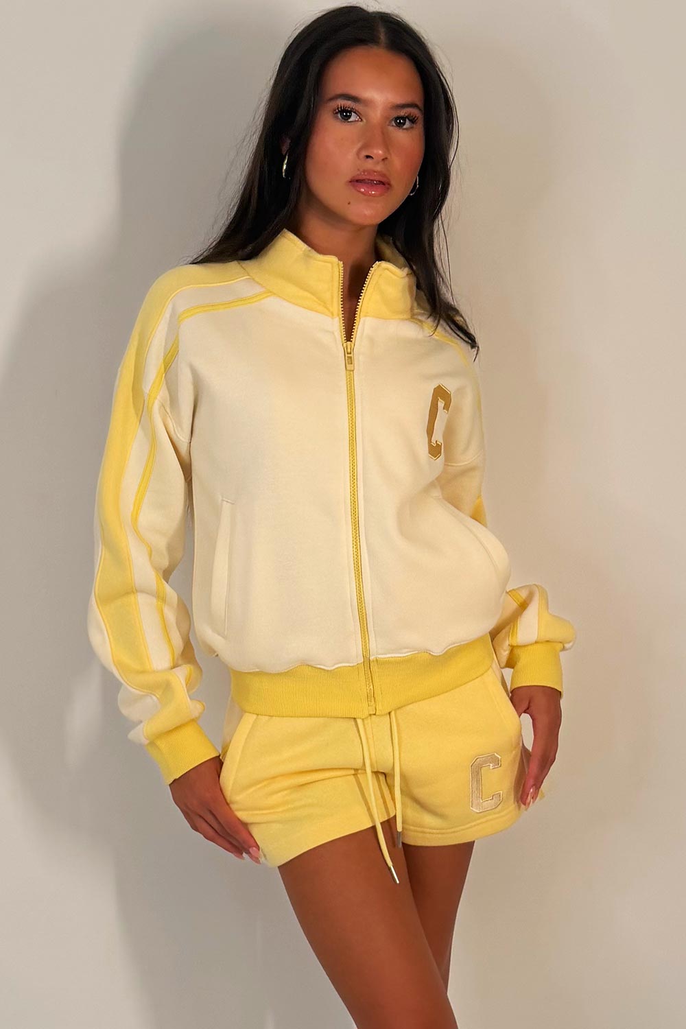womens short tracksuit with c emblem styledup airport outfit zara uk
