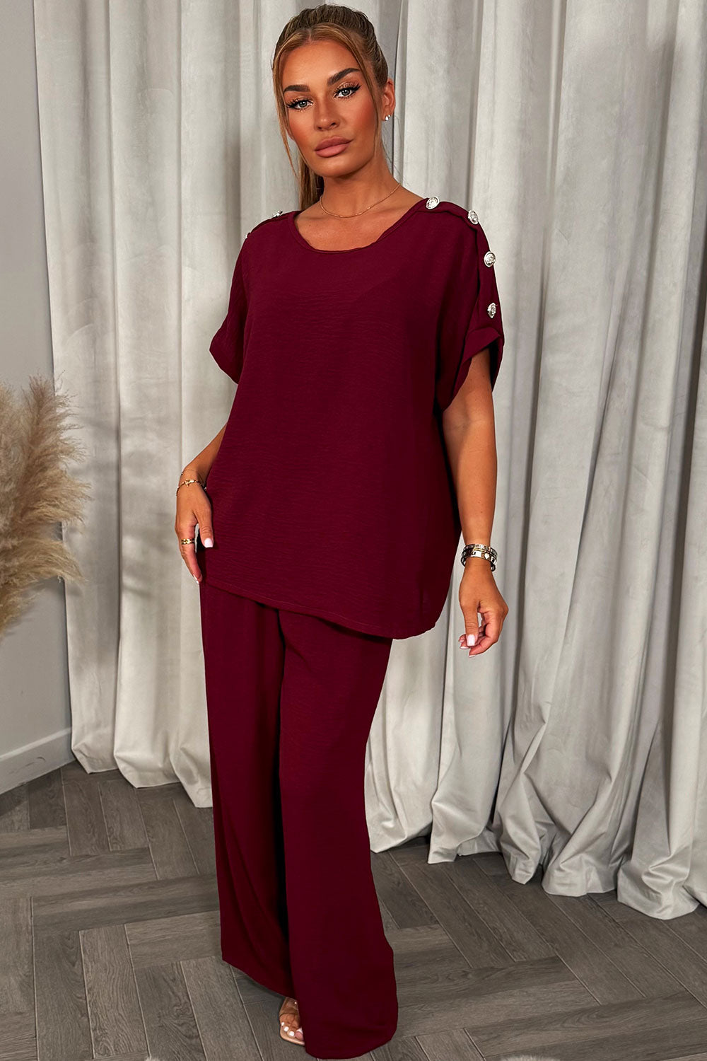 christmas party co ord with gold button shoulder top and trousers outfit for womens