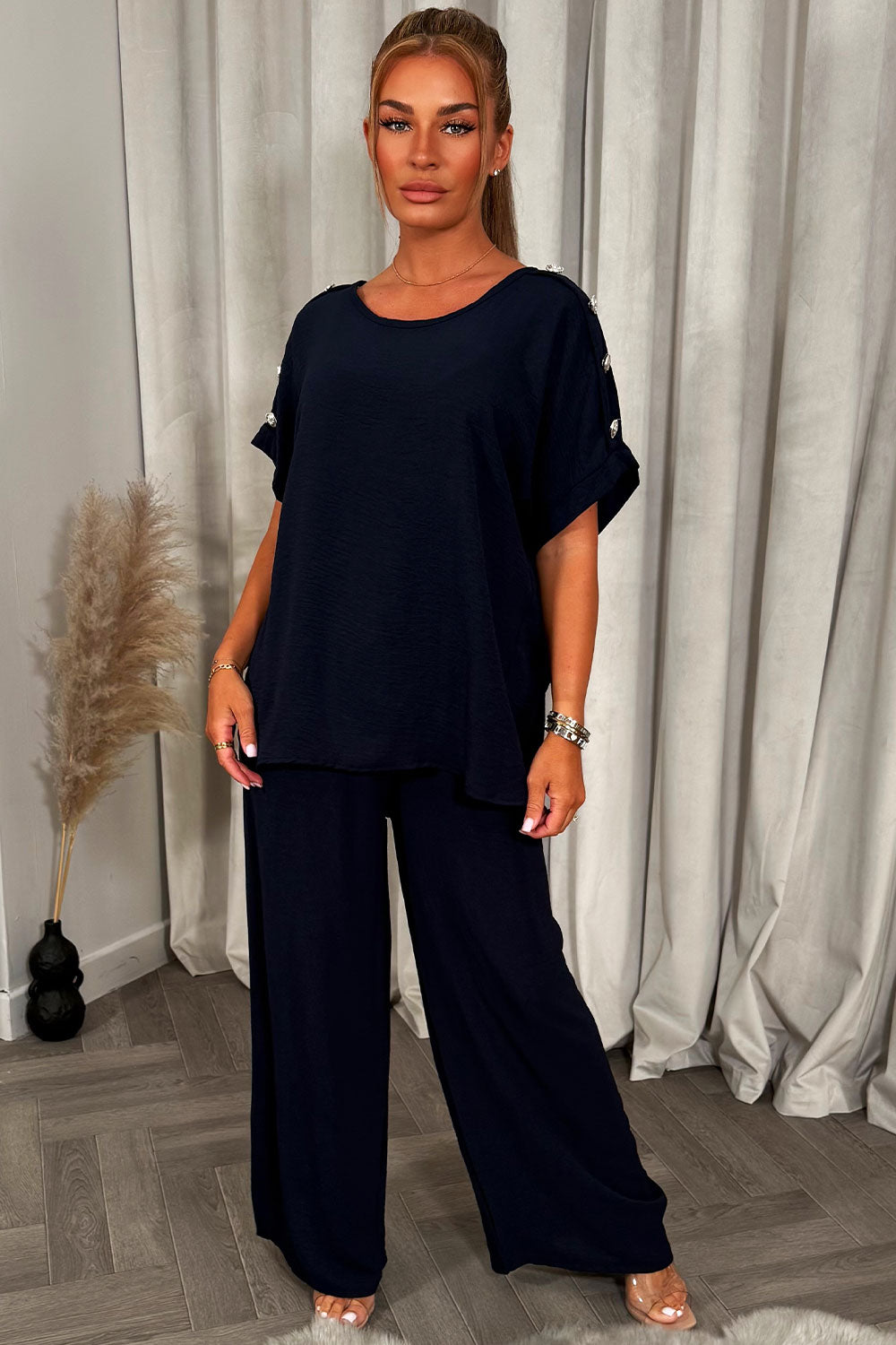 christmas party co ord with gold button shoulder top and trousers outfit for womens