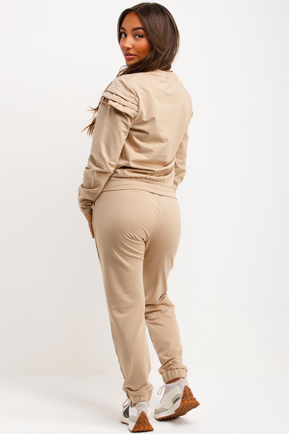 frill shoulder gold button top and trousers two piece tracksuit set airport outfit