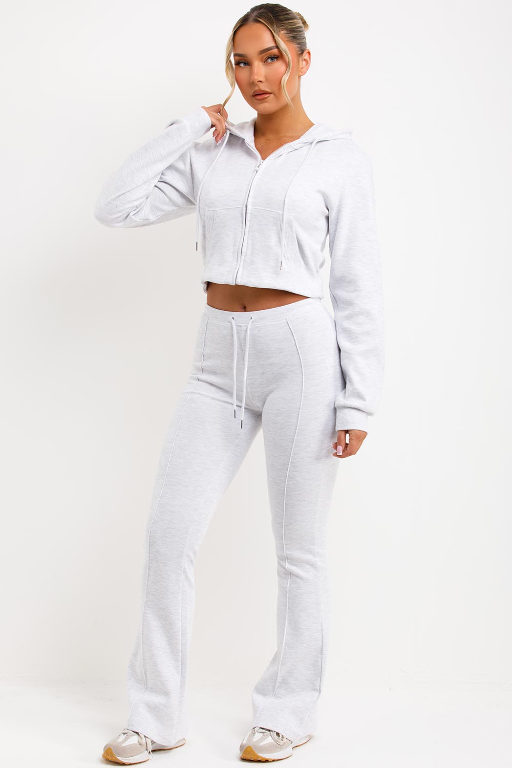 interlock sweatshirt and bell bottom top stitched trousers two piece loungewear set