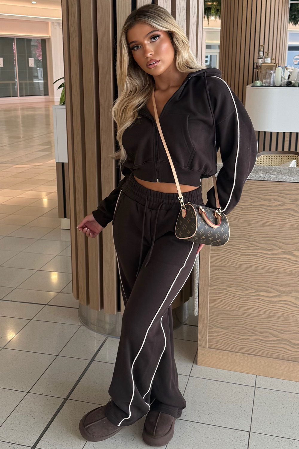 womens crop hoodie and joggers tracksuit set airport outfit styledup