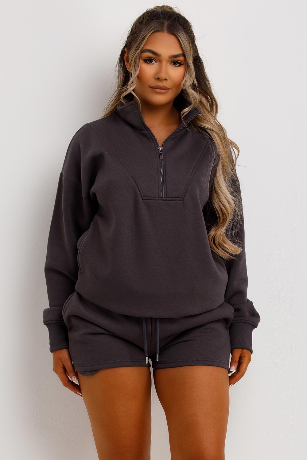 womens runner shorts and half zip jumper tracksuit lounge set airport outfit uk