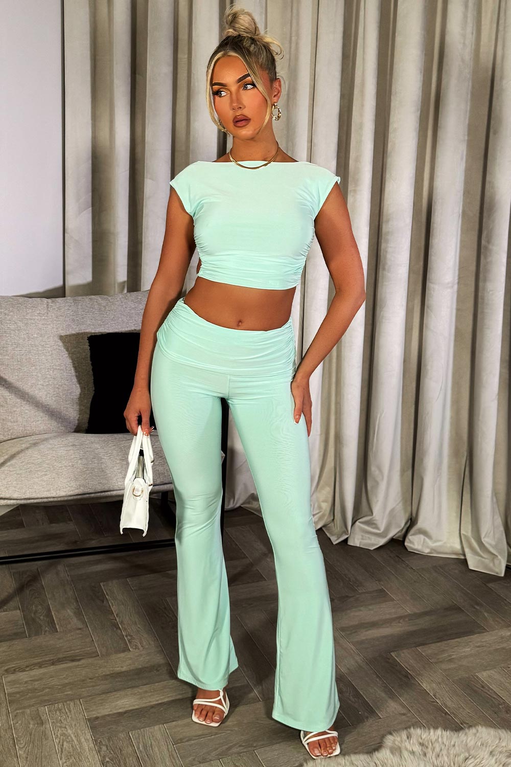 fold detail flare trousers and backless crop top co ord set going out summer occasion outfit