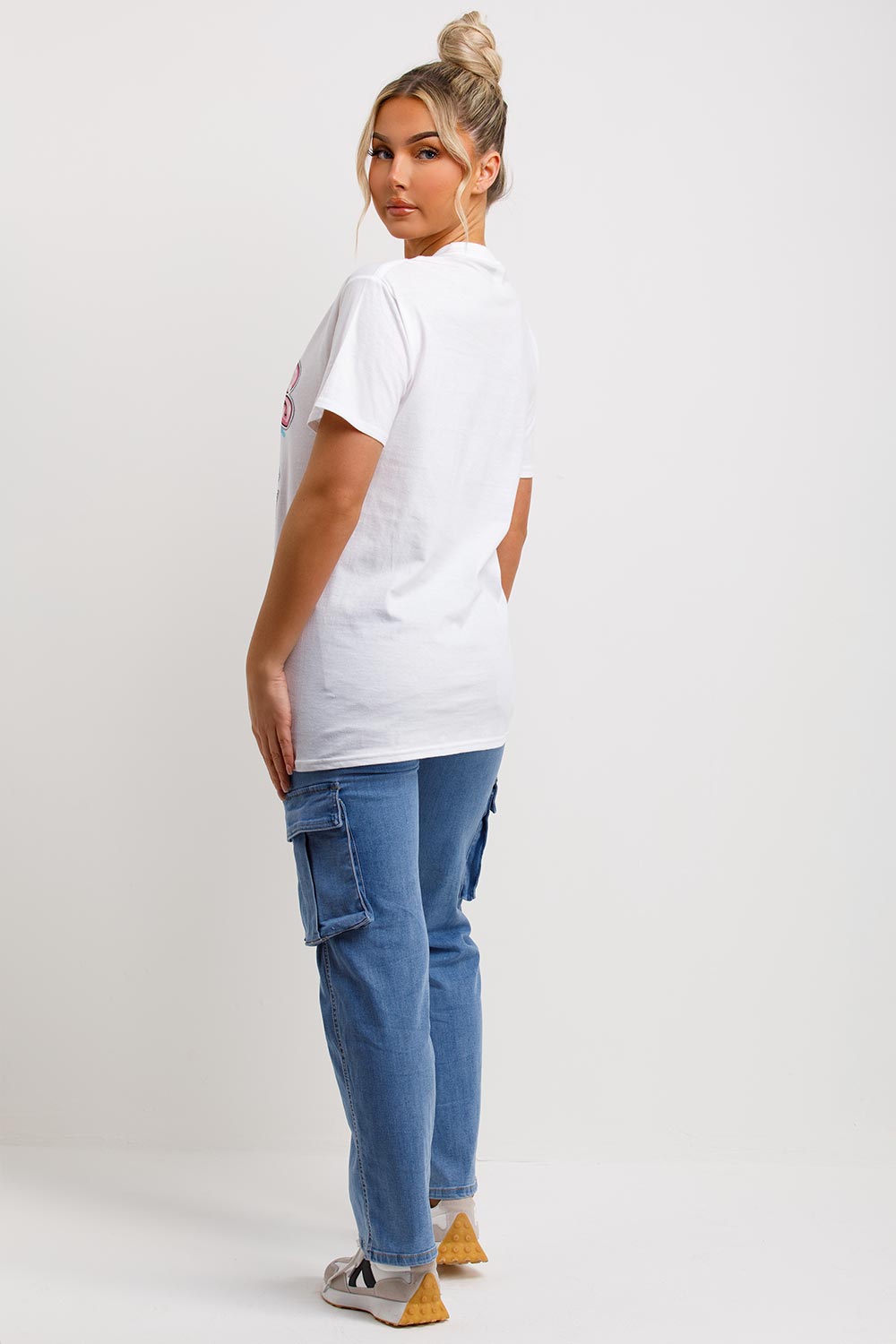 womens white oversized t shirt with teddy bear zero regrets graphics