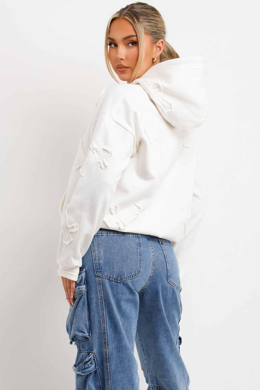 womens oversized hooded sweatshirt with cross applique