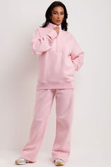 pink half zip sweatshirt and joggers loungewear co ord set airport outfit