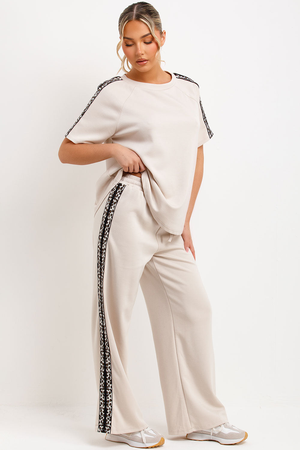 womens leopard print stripe top and trousers two piece loungewear set styled up