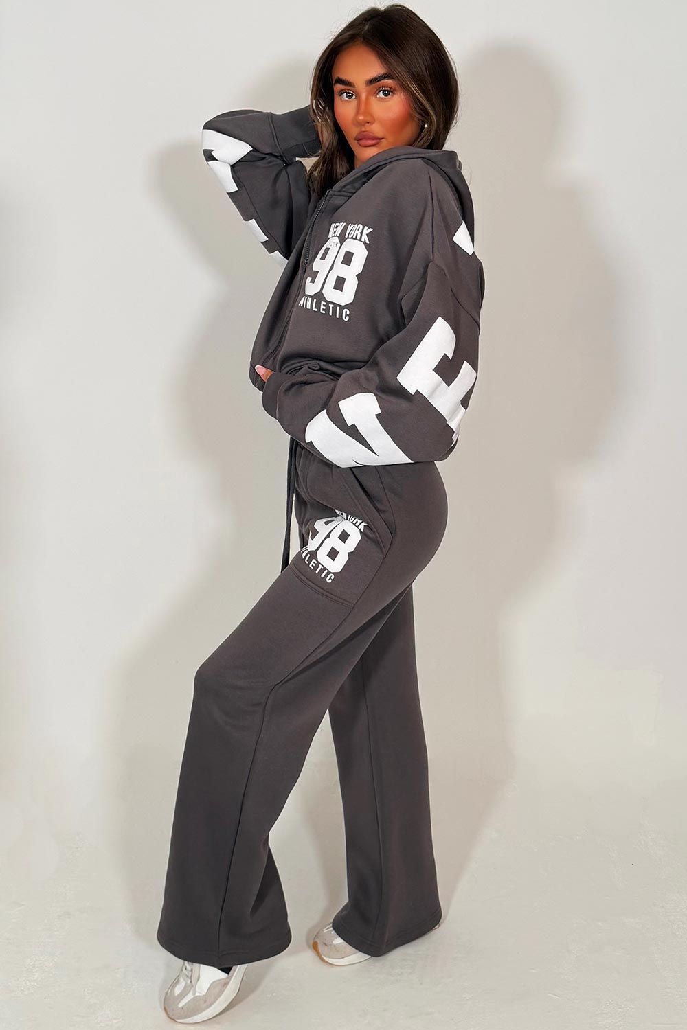 womens hoodie with zip through long sleeves drop shoulder and wide leg joggers two piece tracksuit set new york athletic writing