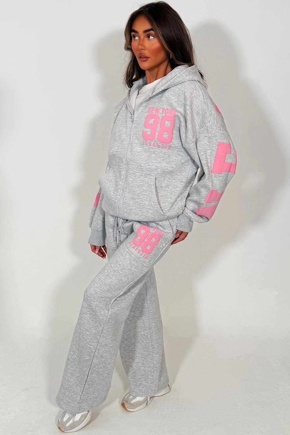 womens hoodie with zip through long sleeves drop shoulder and wide leg joggers two piece tracksuit set new york athletic writing