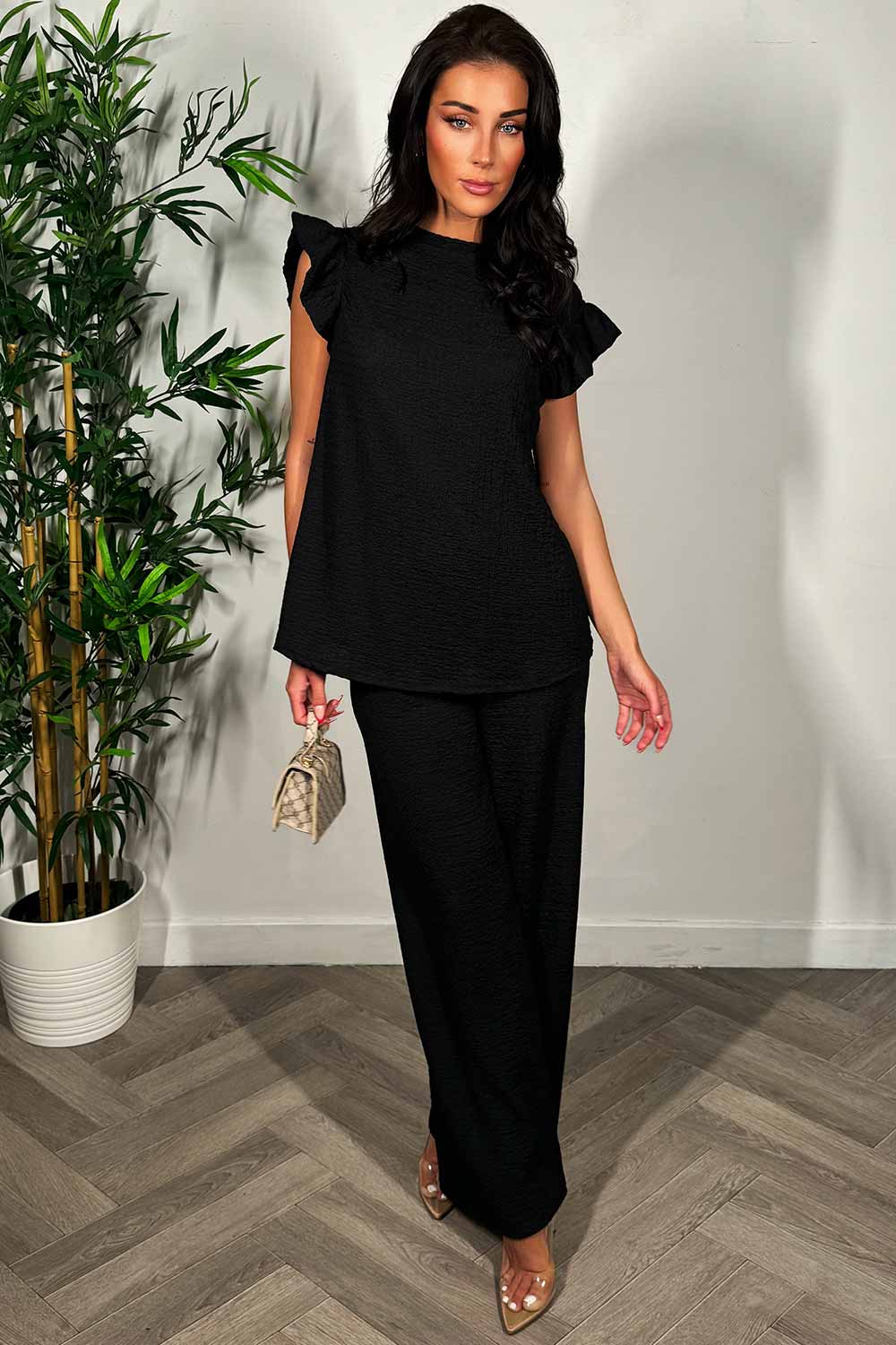 womens frill sleeve top and wide leg trousers set