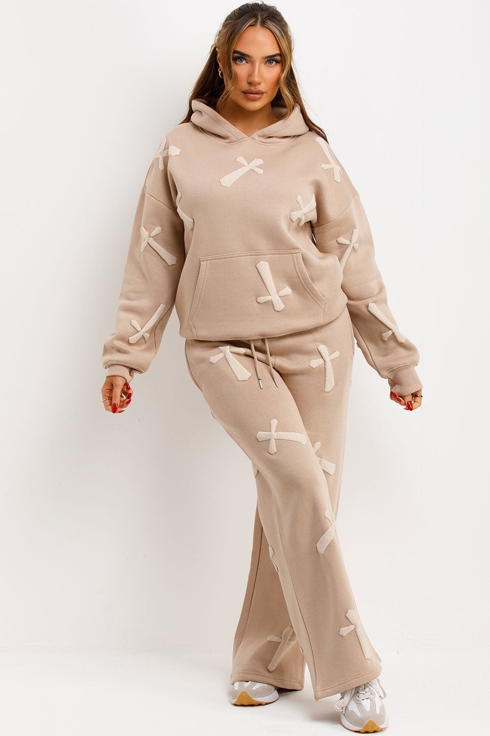 womens hooded tracksuit with bubble puffed up crosses