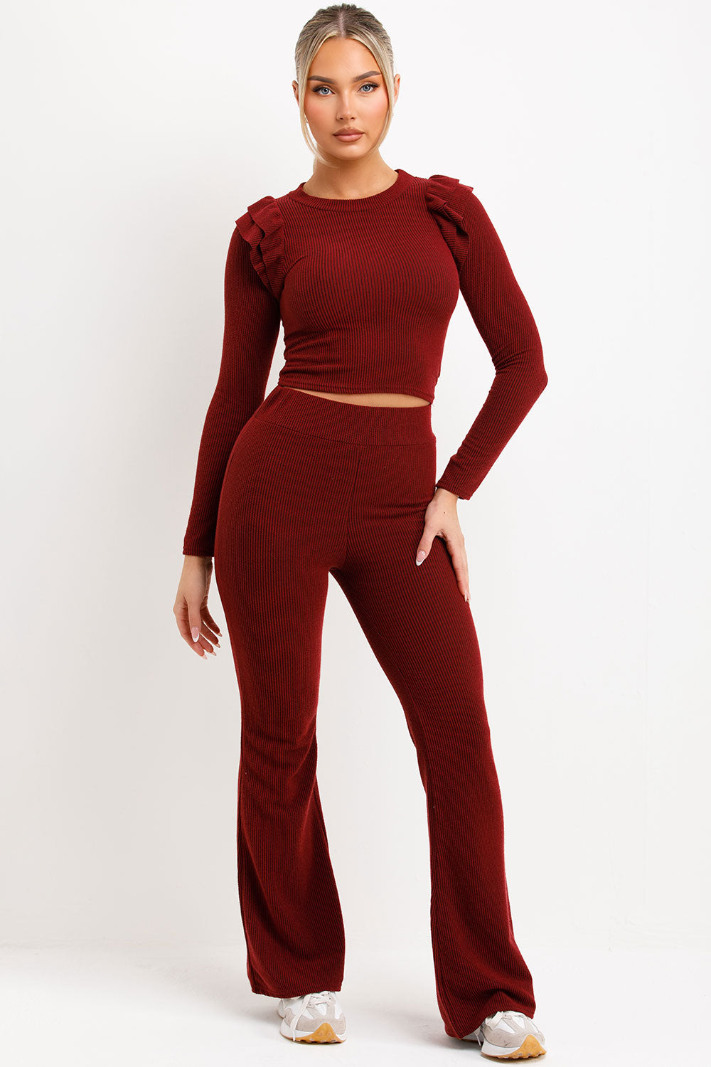 ribbed long sleeve frill shoulder top and skinny flare trousers two piece loungewear set womens