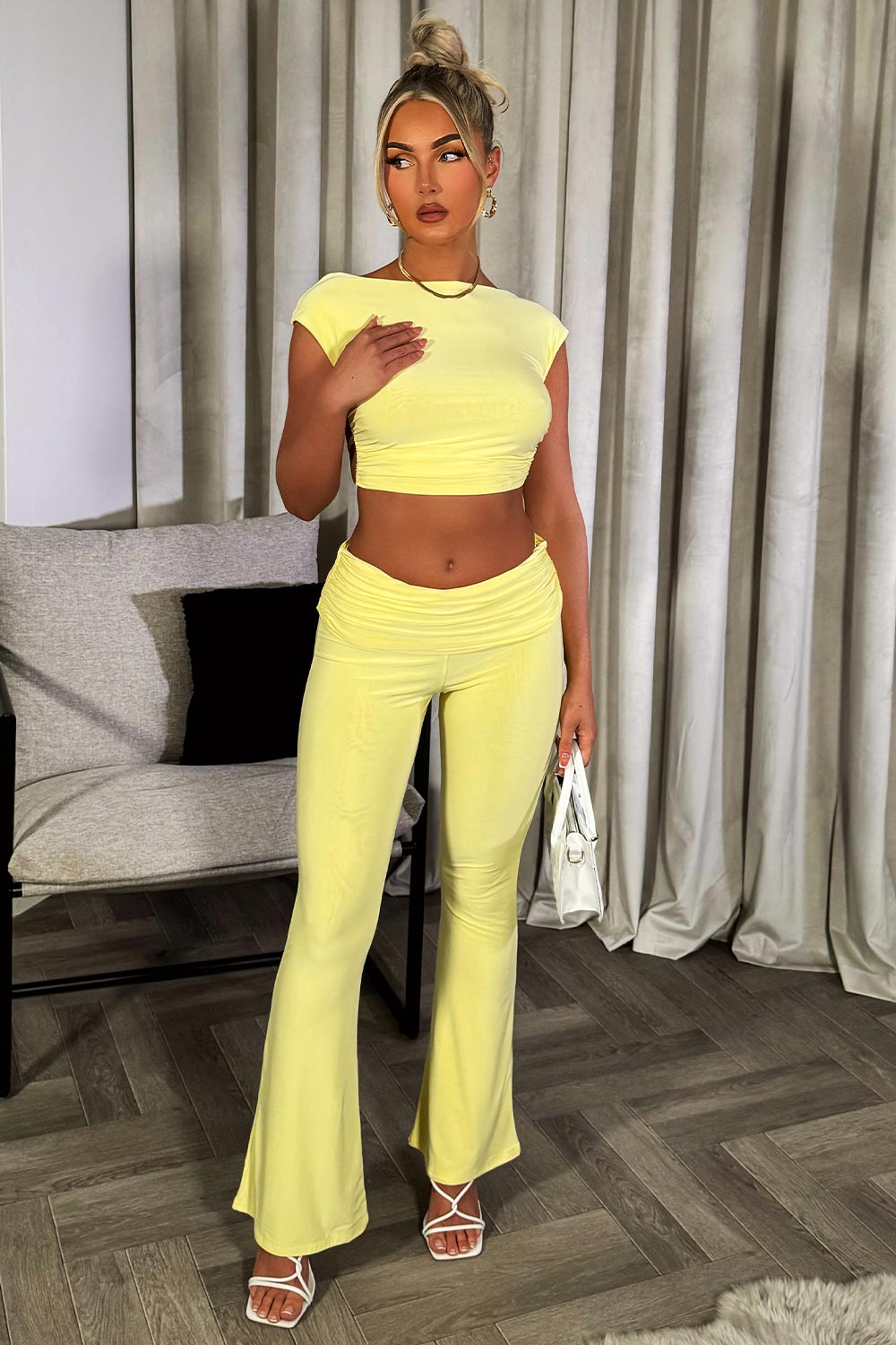 backless crop top and fold over detail flare trousers set going out summer occasion outfit