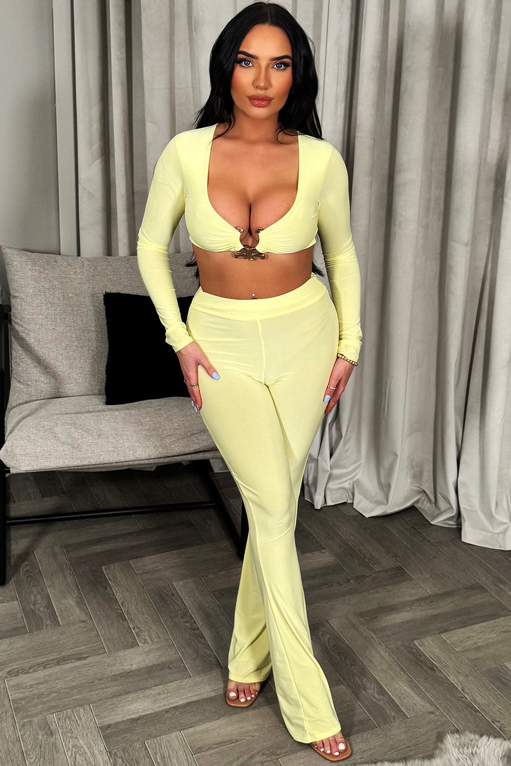 gold buckle crop top and flare trousers two piece set yellow