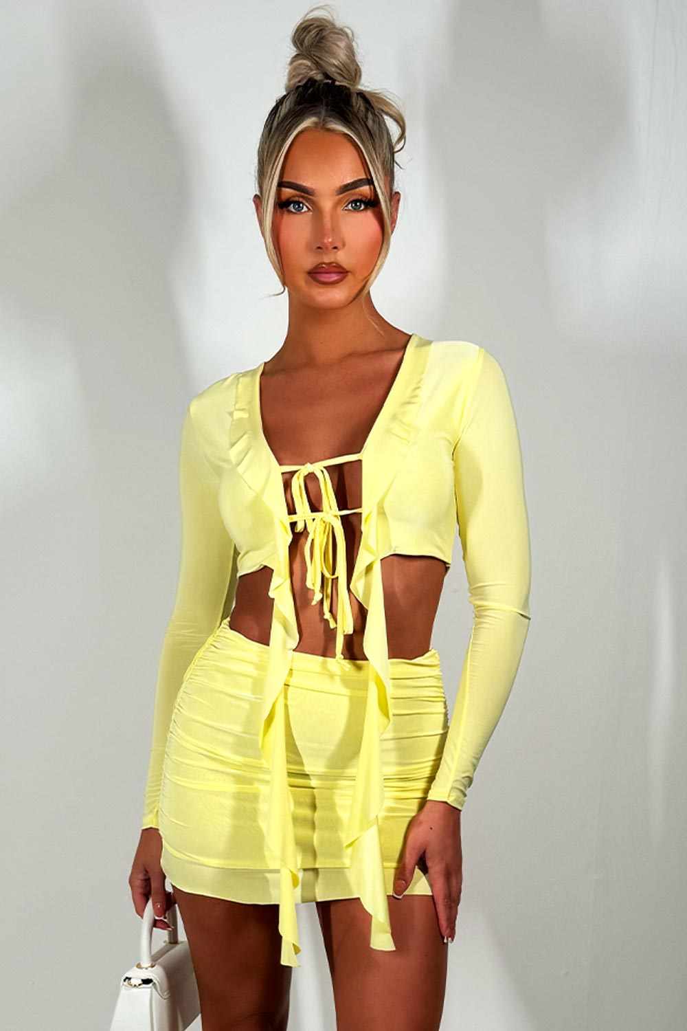 festival frill hem mini skirt and tie front long sleeve crop top set going out holiday outfit