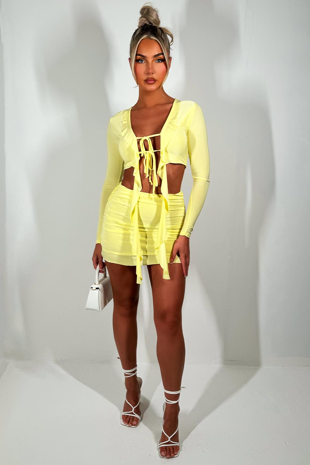 frilly skirt and tie front long sleeve crop top co ord set festival going out holiday outfit