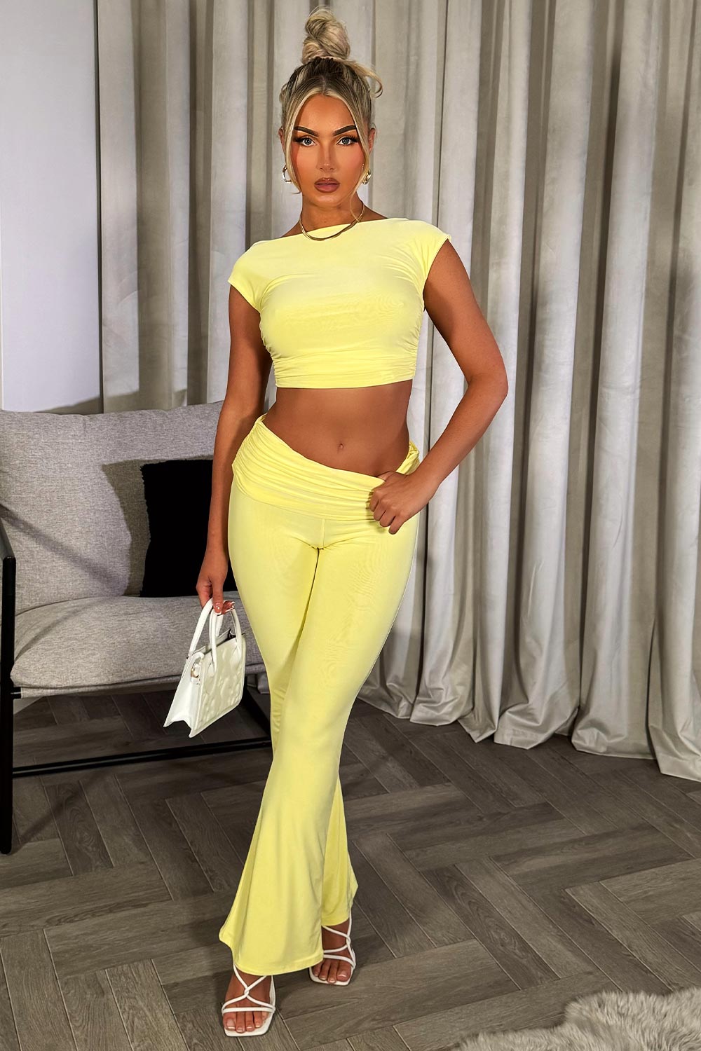 backless crop top and fold detail flare trousers co ord set yellow