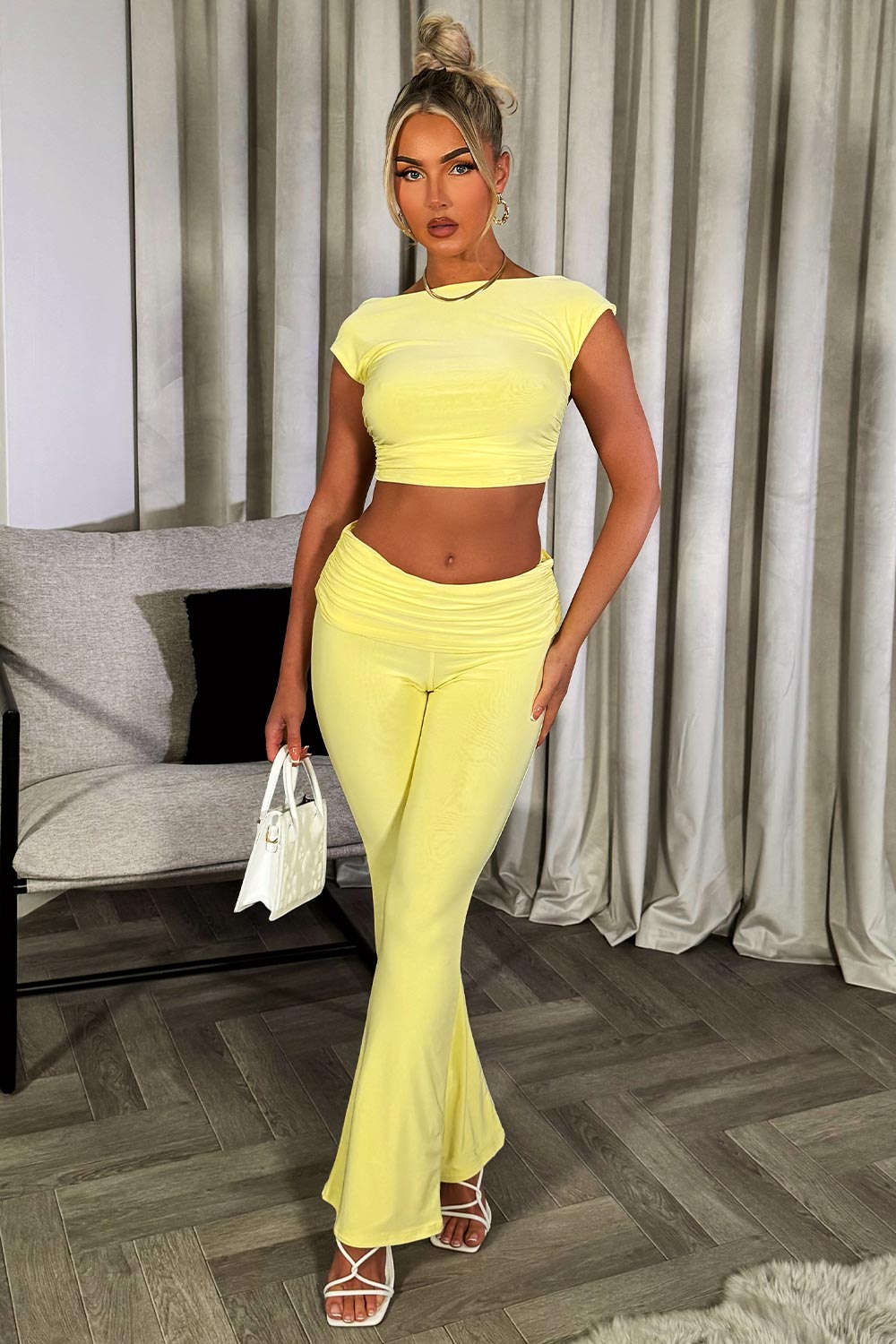 fold over flare trousers and backless crop top set going out outfit