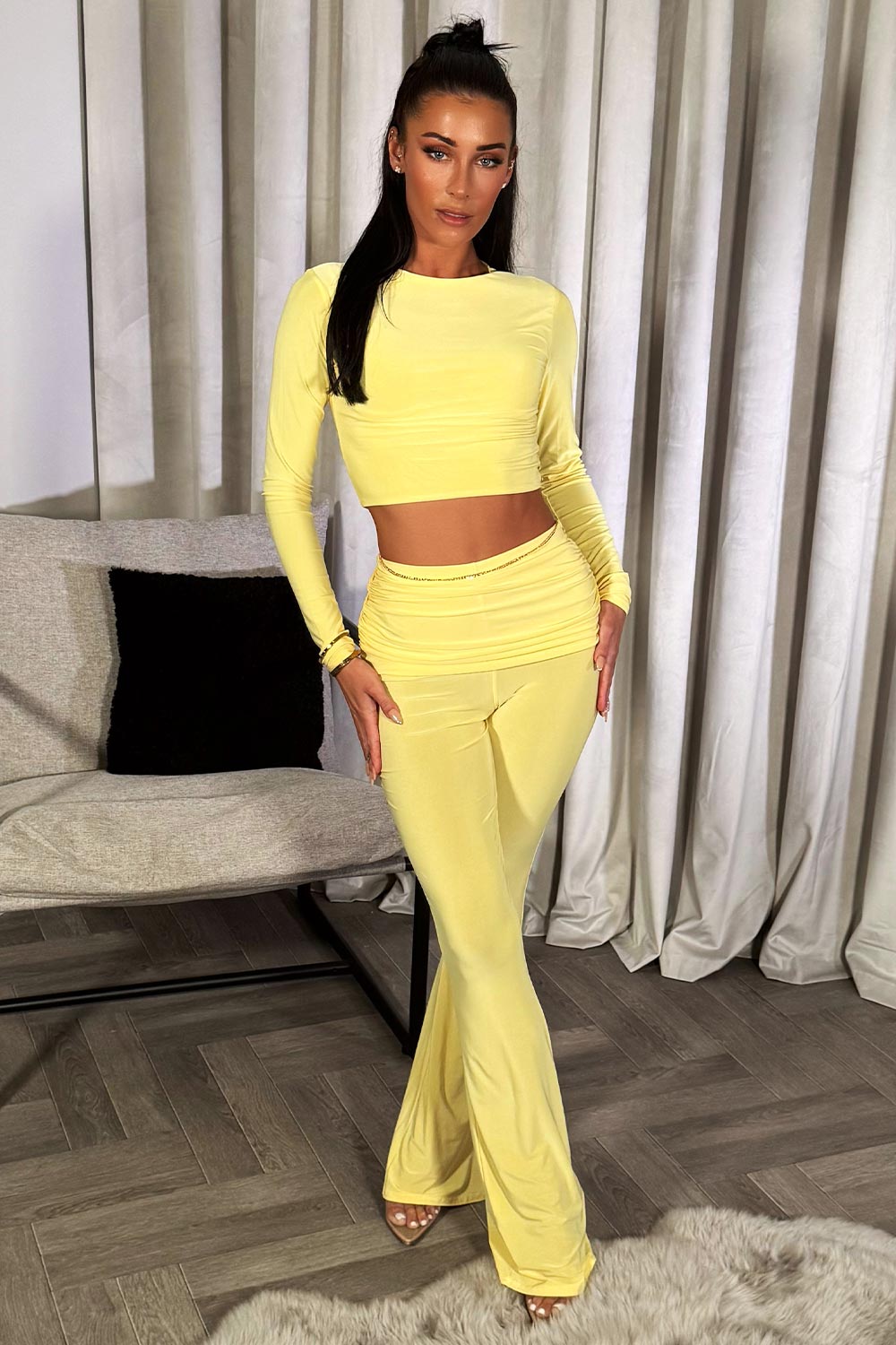 fold over waist skinny flared trousers and top co ord set yellow
