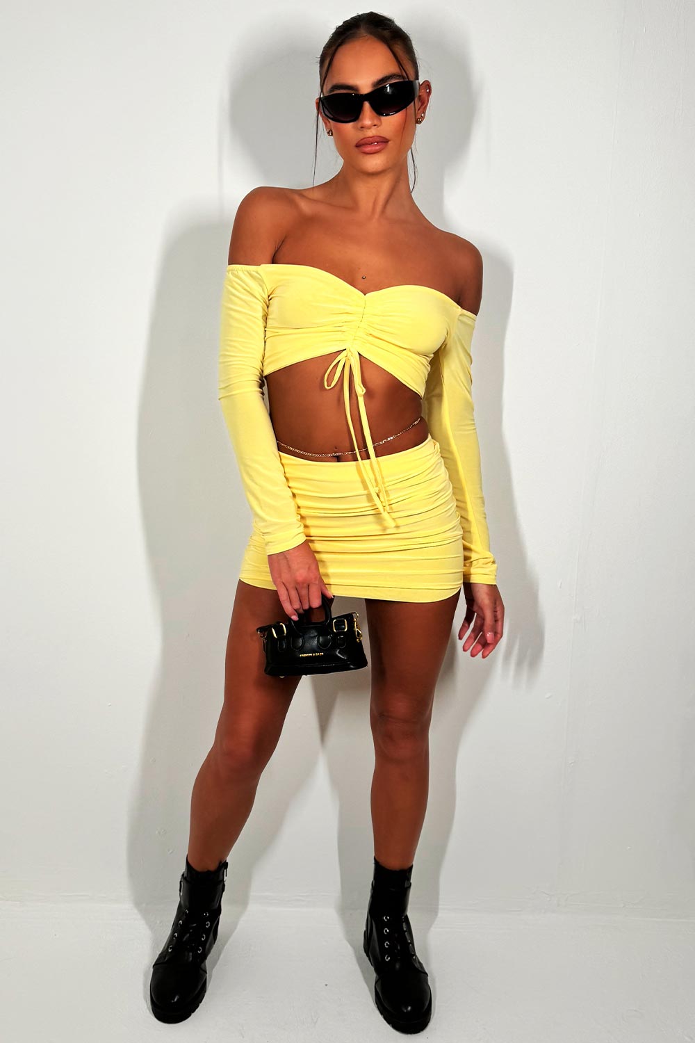 off shoulder long sleeve crop top and mini skirt co ord set