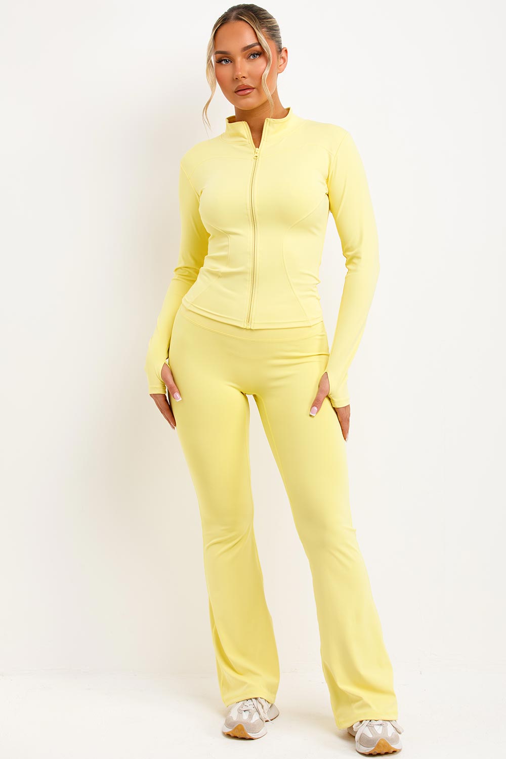zip up sports jacket and scrunch bum skinny flare trousers two piece set yellow