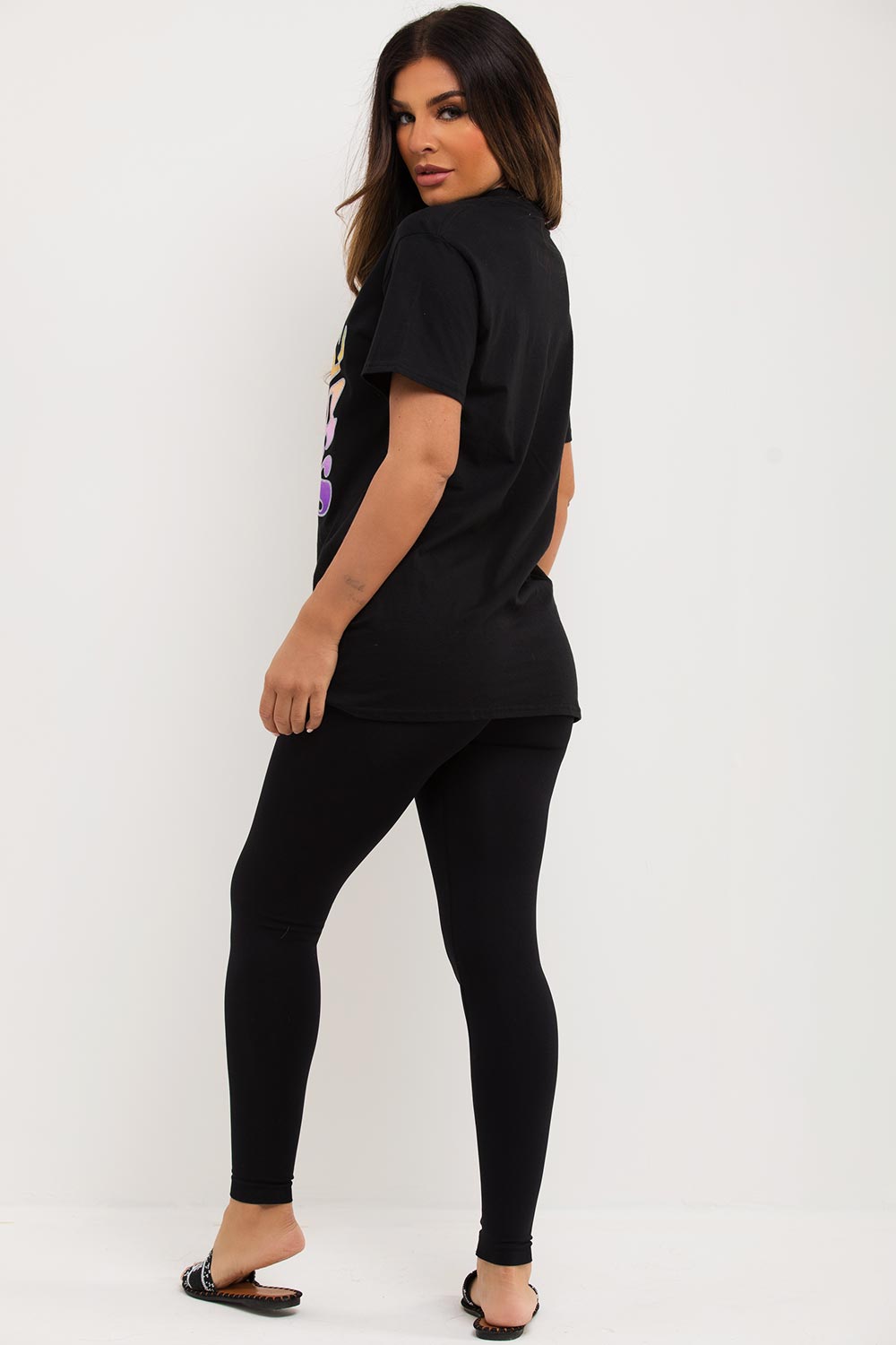 black oversized t shirt with love never fails slogan