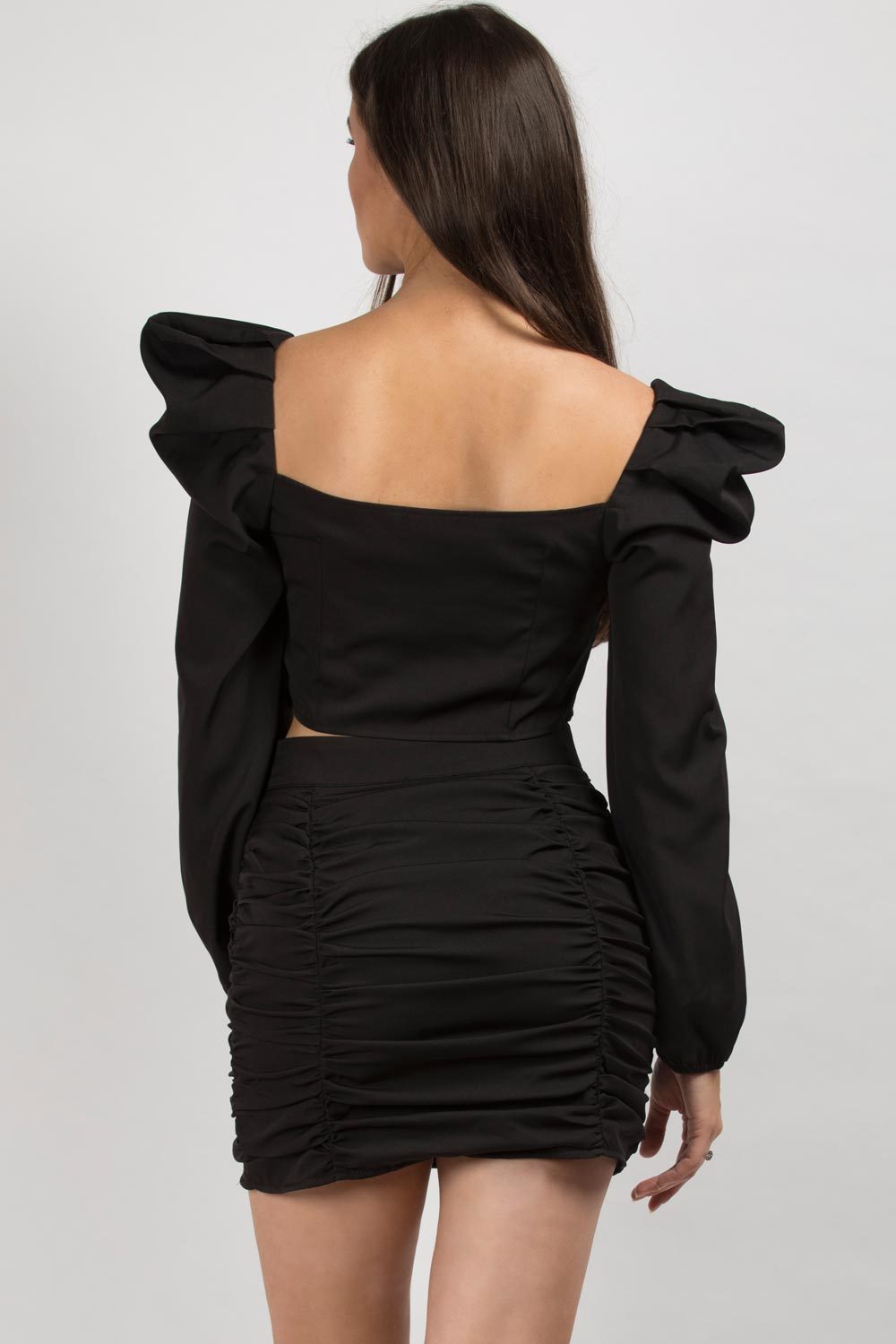 black crop top and mini skirt