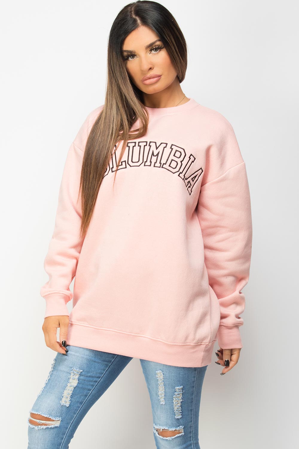 pink sweatshirt with cloumbia slogan styledup fashion