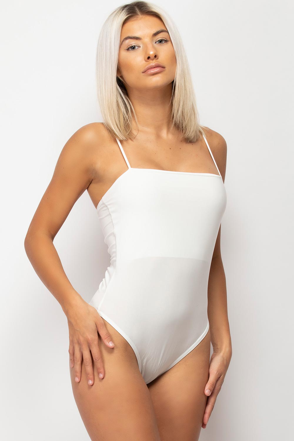 cream slinky bodysuit