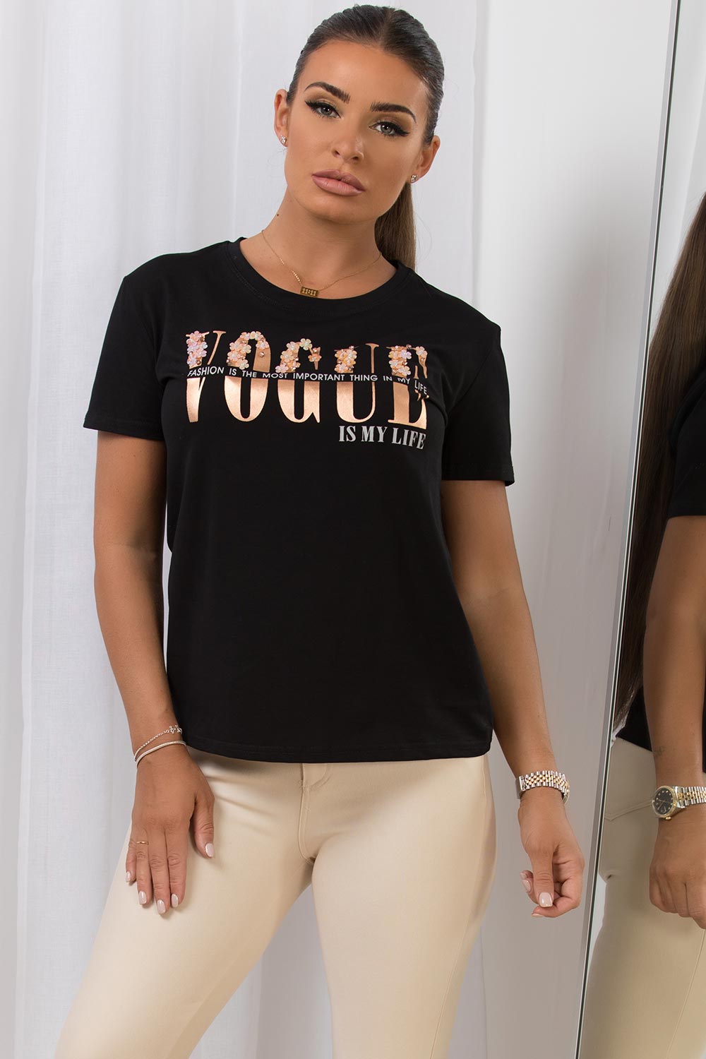 womens black t shirt with vogue slogan