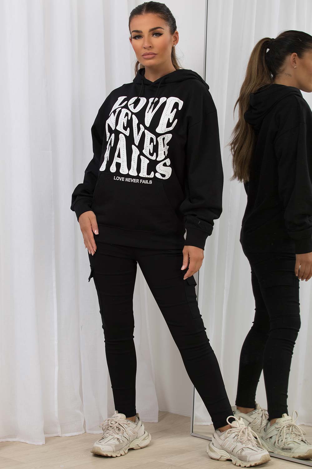 womens hooded sweatshirt with love never fails slogan