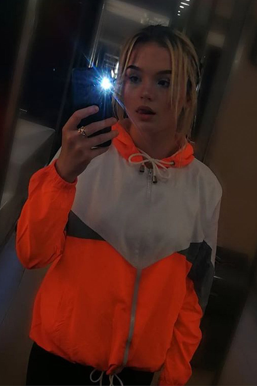 neon orange hooded paneled windbreaker