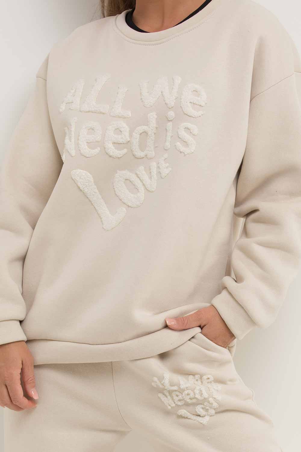 loungewear co ord set with all we need is love towelling