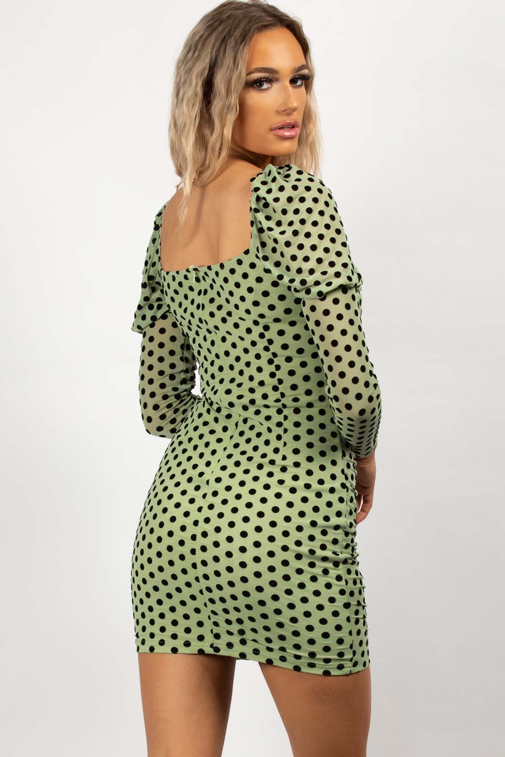 green polka dot bodycon mini dress